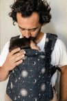 Introducing the Boba X - a versatile, adjustable baby carrier designed to last from birth to toddlerhood. Enjoy its softness, support, and adjustability, plus its beautiful celestial print on warm charcoal print. Shop now!